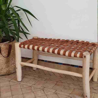 Luxurious Moroccan bench in solid wood and camel leather, a blend of elegance and craftsmanship.