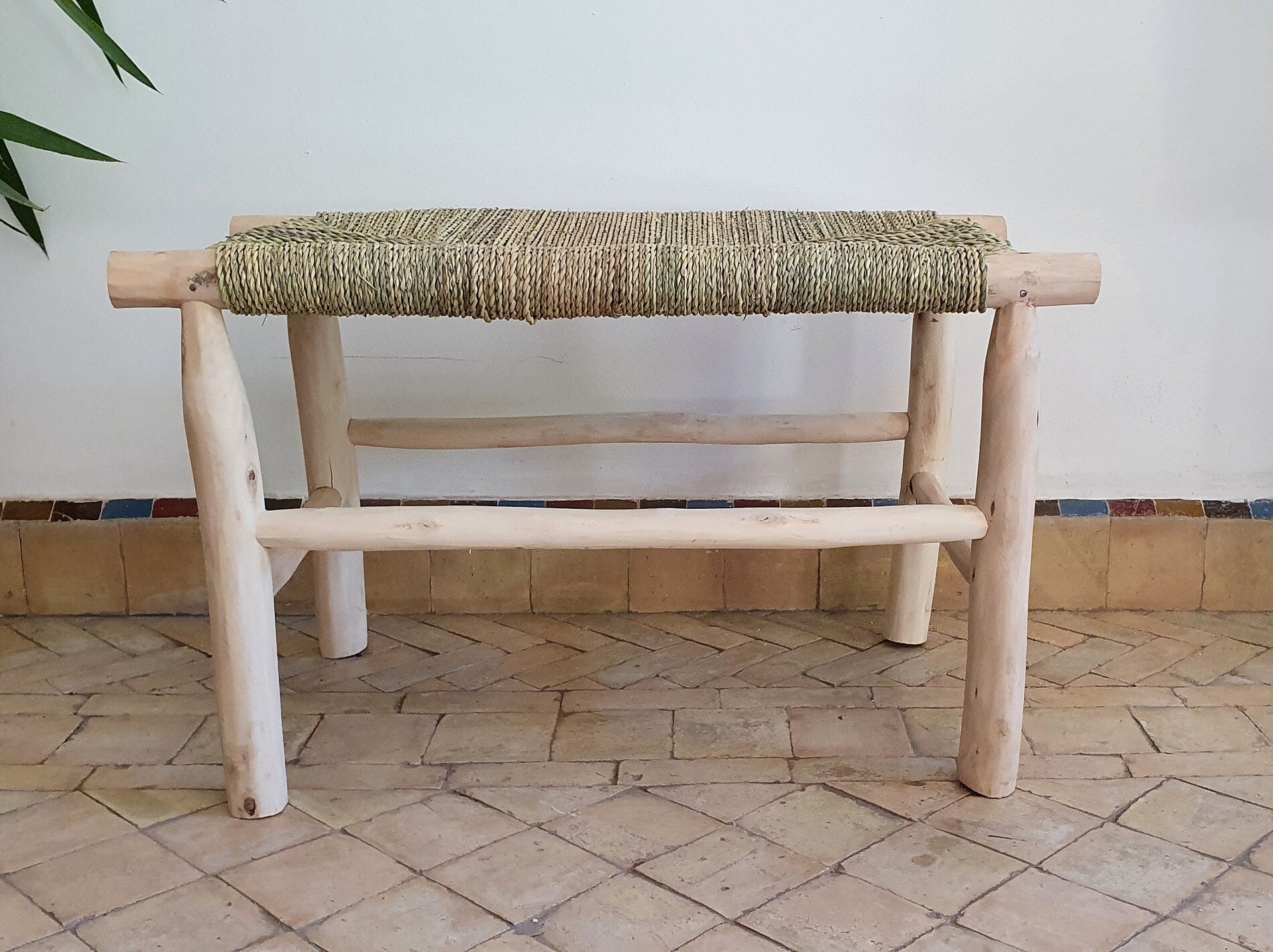 Artisanal Moroccan bench made from solid wood and woven detailing
